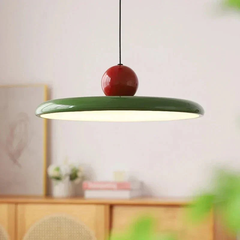 Aveloro Cerasca LED-Hängeleuchte in Grün über einem Wohnzimmertisch