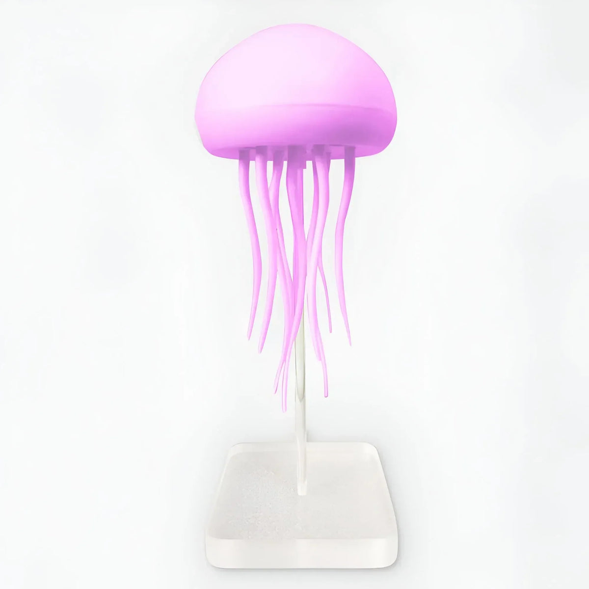 Aveloro Medusia LED-Dekolampe im Quallen-Design vor einem Bücherregal